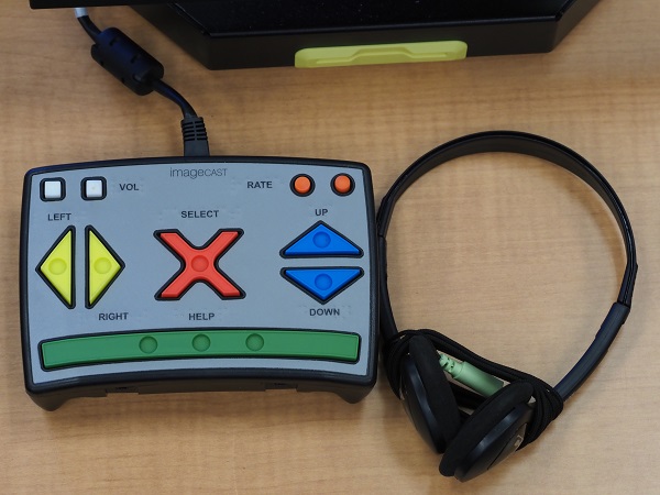 Picture of Dominion’s ImageCast X (ICX) Ballot Marking Device Audio-Tactile Interface (ATI) -- a “game controller” with tactile navigation buttons.