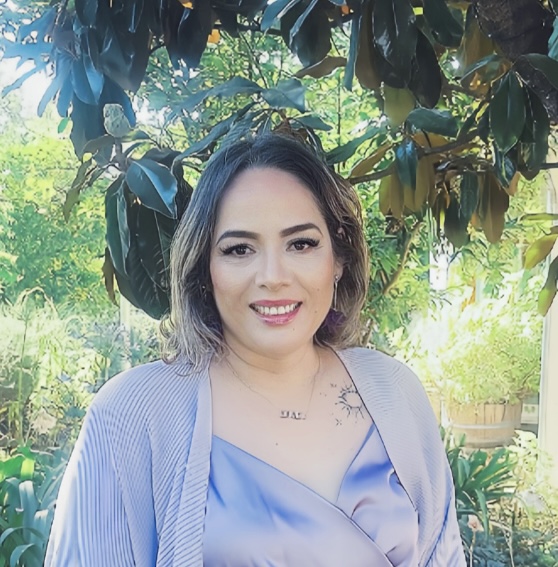 Woman outdoors smiling 